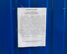 Громкоговоритель и вода в баклажках: как живёт непокорная высотка на Московском, 68